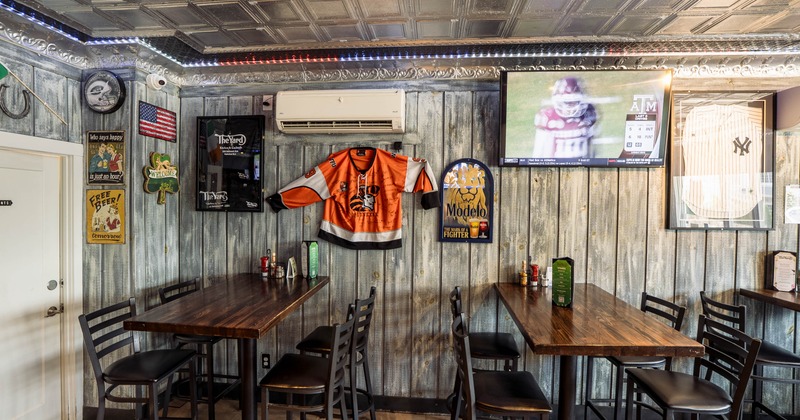 Seating area with rustic wood plank walls and decorations