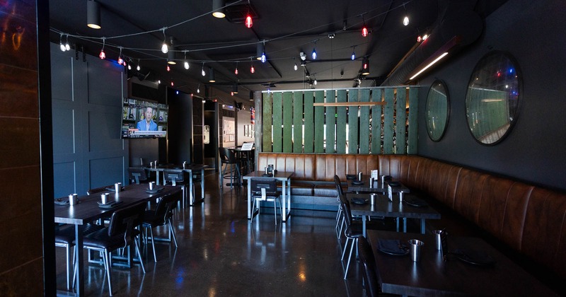 Interior, tables and chairs in dining area