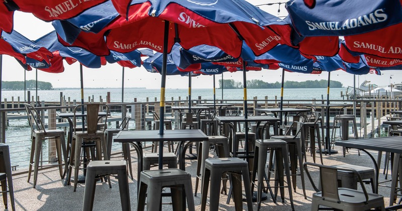 Exterior seating area, tall tables and bar stools