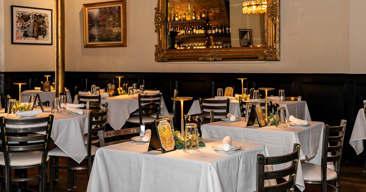 Interior, tables and chairs ready for guests
