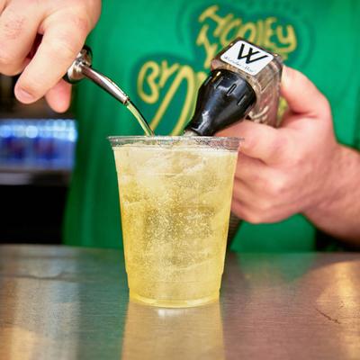 Bartender making a cocktail.