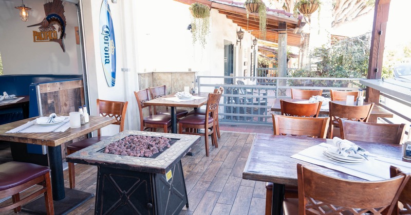 Exterior, balcony with seating area and dinning tables