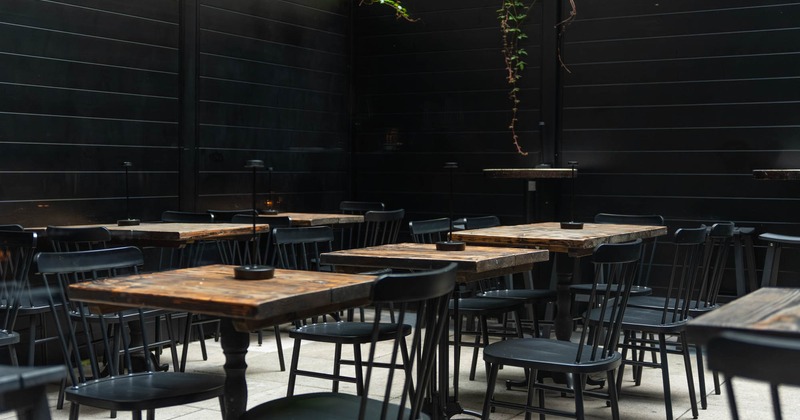 Exterior seating area with chairs and tables