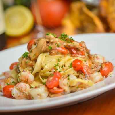 Seafood and cherry tomato pasta.