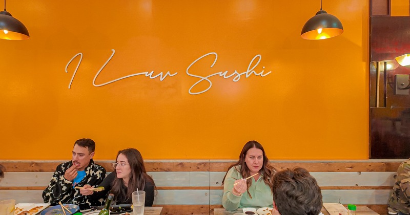 Interior, guests enjoying food at tables