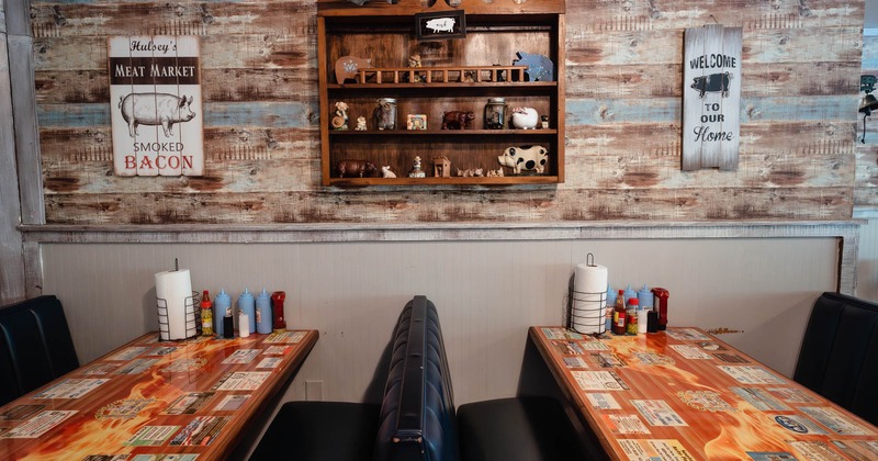 Interior, leather benches and tables ready for guests