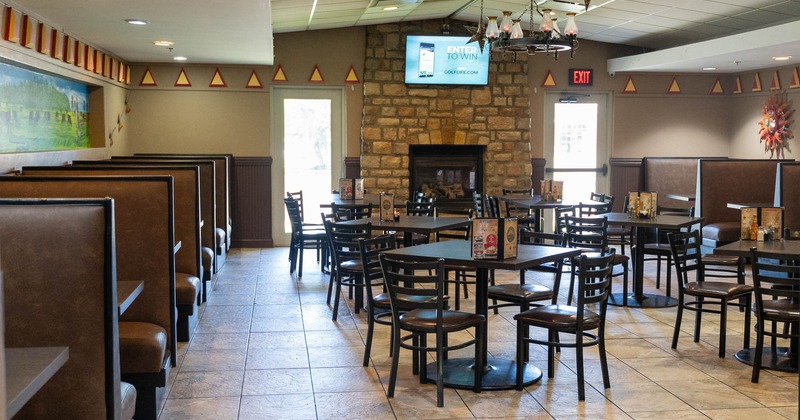 Interior, chairs and tables, restaurant booths on the left