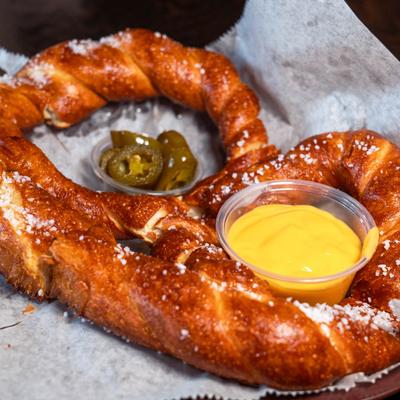 Giant pretzel with cheese dip.