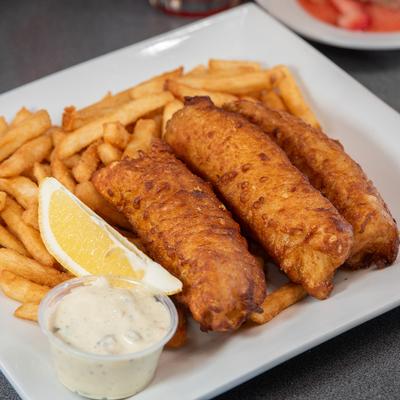 Crispy fried fish served with fries and tartar sauce.
