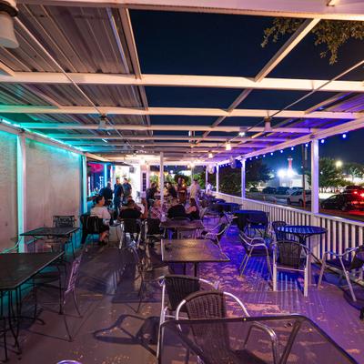 Tables and chairs outside.