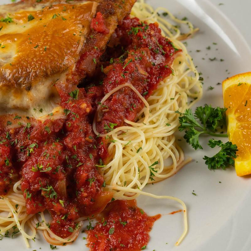 Chicken Parmesan over Angel Hair photo