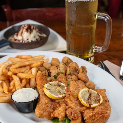 Fish & Chips accompanied with s'mores skillet cookie and beer.