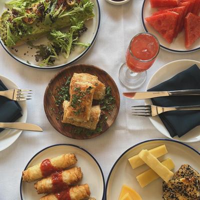 Various brunch dishes served on the table, top view.