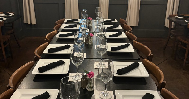 Table settings, tables set with plates, napkins and glasses for wine