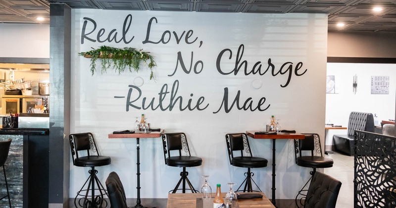 The restaurant's interior, tables and chairs