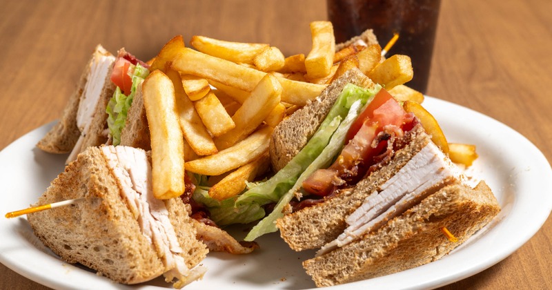 Turkey Club sandwich and fries