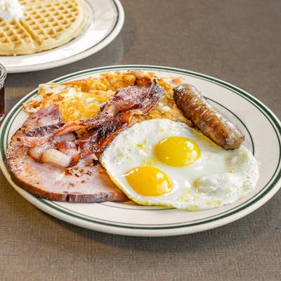 Lumberjack - ham, ssausage, bacon, 2 eggs and hashbrowns along with a waffle.