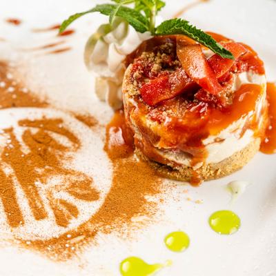 Guava Cheesecake with mint and cinnamon dusting.