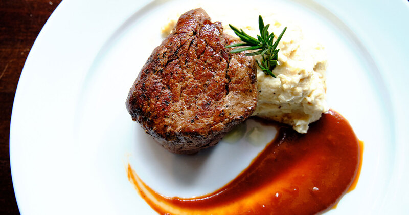 Filet Mignon and mashed potatoes with a sauce