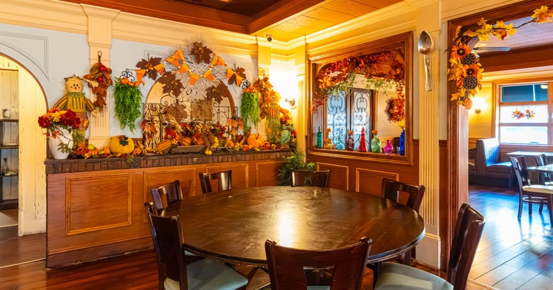 Interior, a big rounded table with chairs