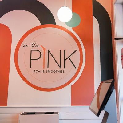 Logo on a wall inside.