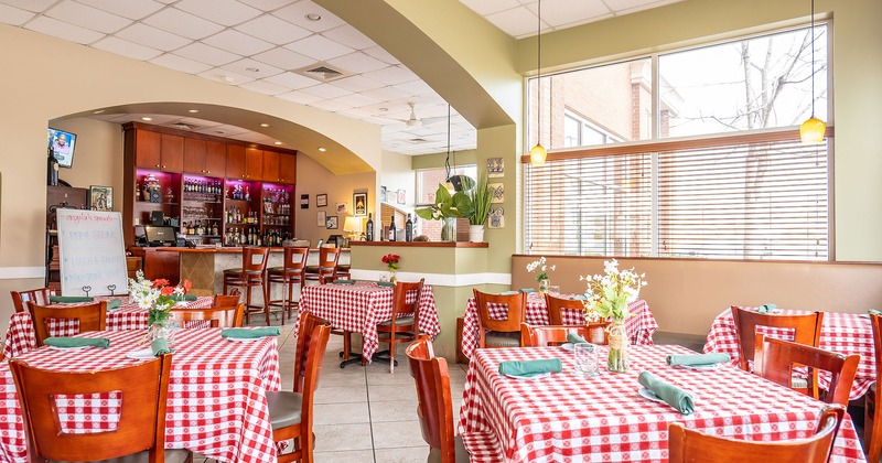 Interior, dining area with set tables ready for guests