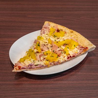 Hawaiian pizza, with ham, cheese, and pineapple.