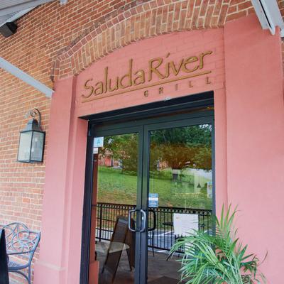 Exterior, restaurant front entrance and sign.