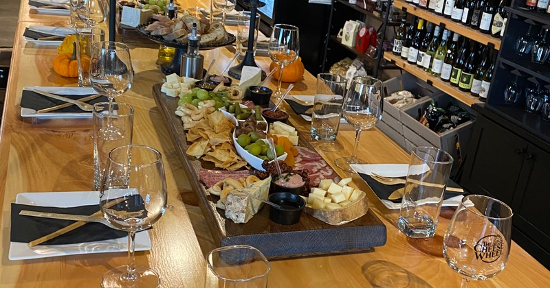 Fully set table with charcuterie board