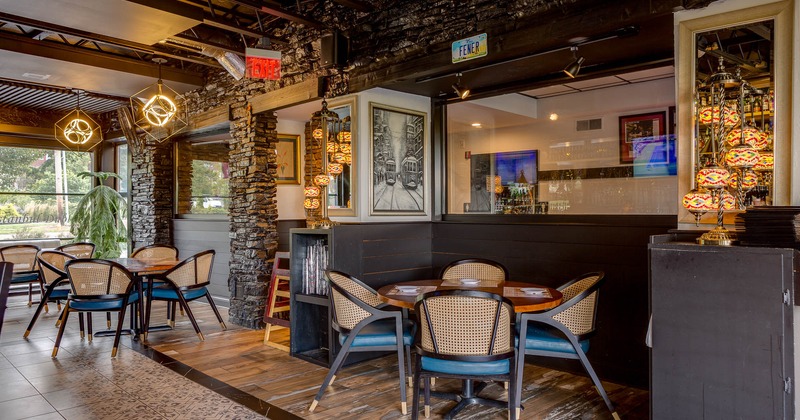 Interior, tables and chairs in seating area
