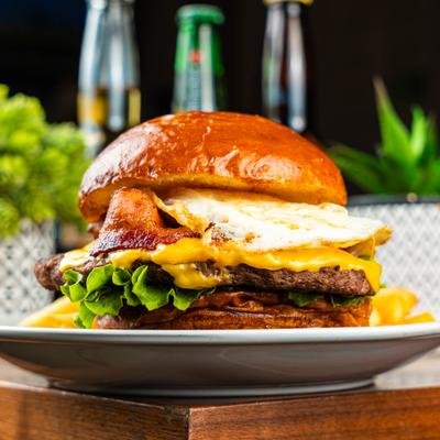 Cheeseburger with bacon and a fried egg.