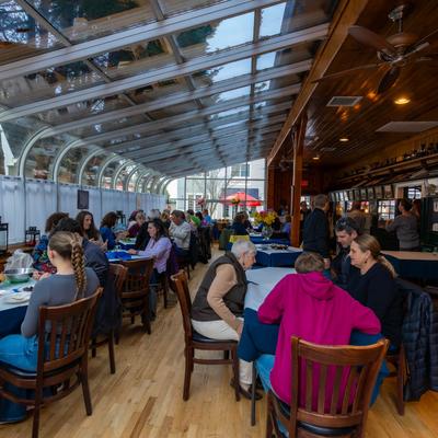 Interior, crowded seating area.
