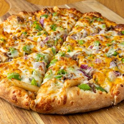 Genoa Special Pizza topped with chicken, green peppers, and red onions.