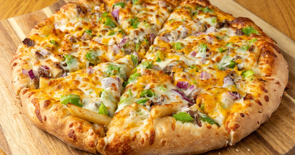 Genoa Special Pizza served on a rustic wooden paddle