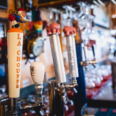 Interior, close up of beer taps.
