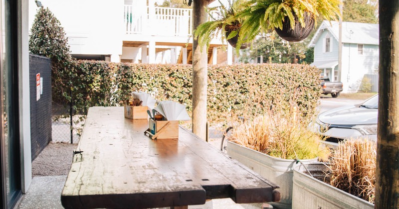 A table in the covered outdoor seating area