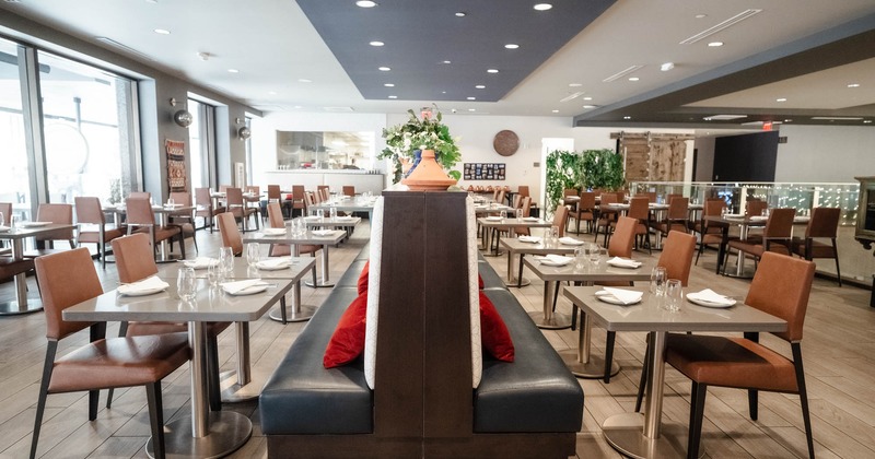 Booths in the middle, tables and chairs on both sides of booths