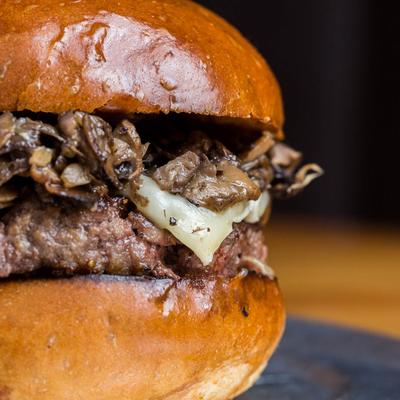 Mushroom and cheese burger, close up.