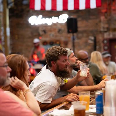 Lots of guests at the bar.