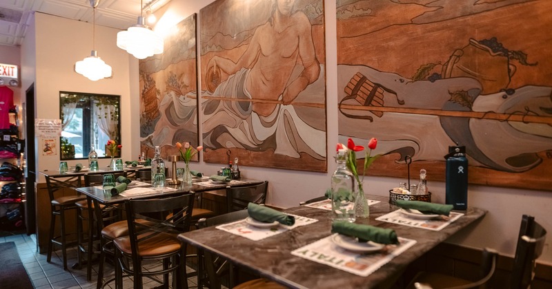 Interior, dining area, marble top tables for four, large format three-piece painting on the wall