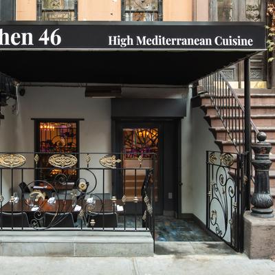 Exterior, entrance with fascia sign on the awning