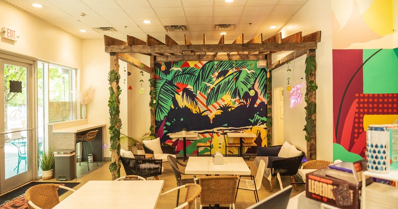 Seating area with mural on wall