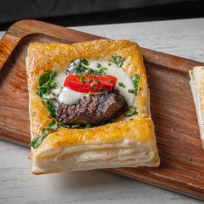Beef wellington pastry with steak center.