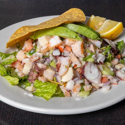 Ceviche with a crispy tortilla and avocado.