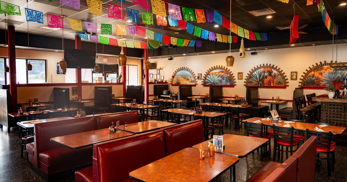 Interior, seating area with booths, tables and chairs