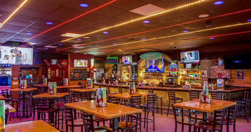 Interior seating and dining area, tall tables and bar stools