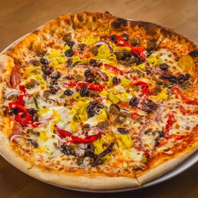 Supreme pizza with pepperoni, Italian sausage, salami, olive, and red bell pepper.
