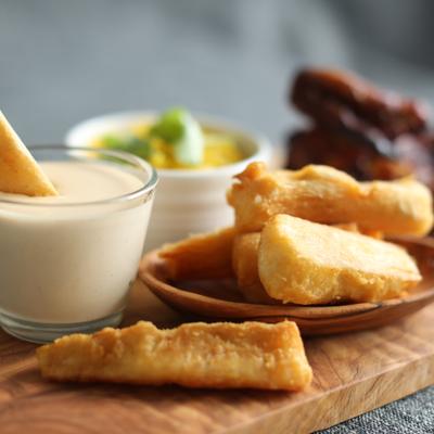 Crispy yuca fries with creamy house made sauce.