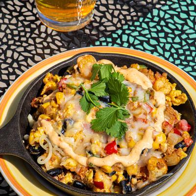 Mixed vegetables with cheese and dip on top