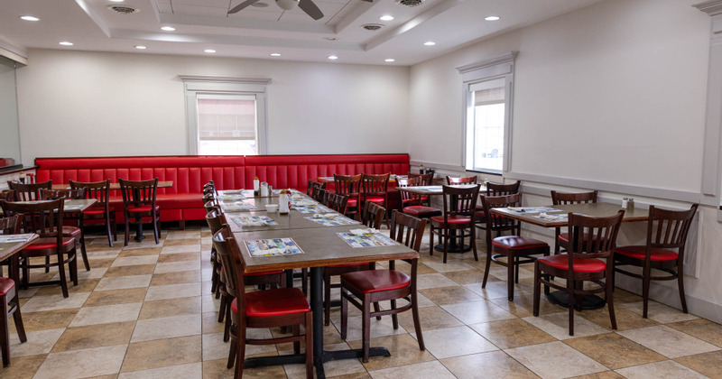 Restaurant interior, tables ready for guests